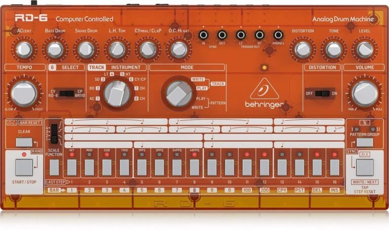 Orange Behringer RD-6 analog drum machine with knobs, buttons, and a sequencer interface