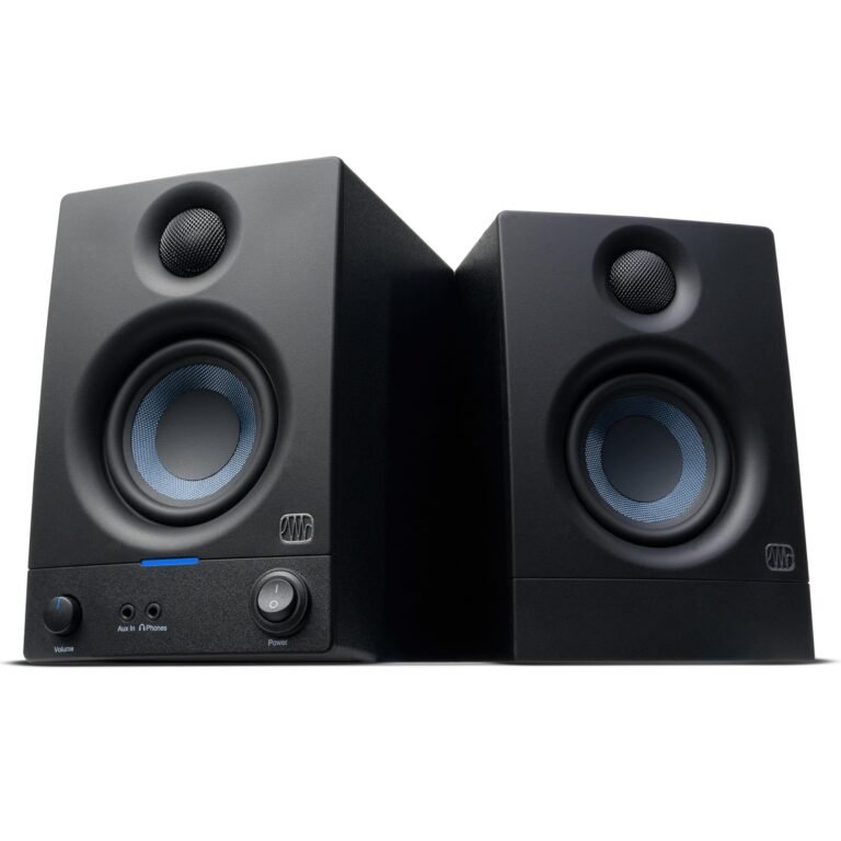 Two black studio monitor speakers with blue accents and controls