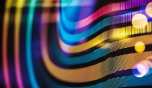 Abstract image of colorful, curved lines with vertical bars and bokeh